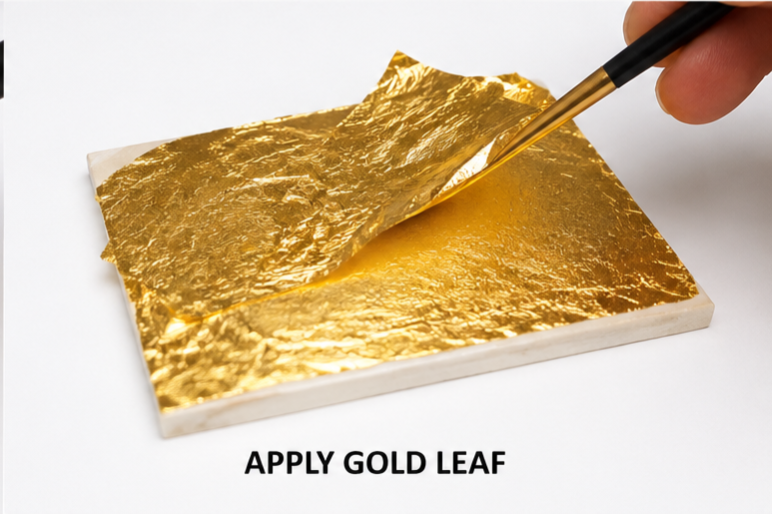 Applying gold leaf with brush after using SUMERAWARQ metal leafing adhesive glue