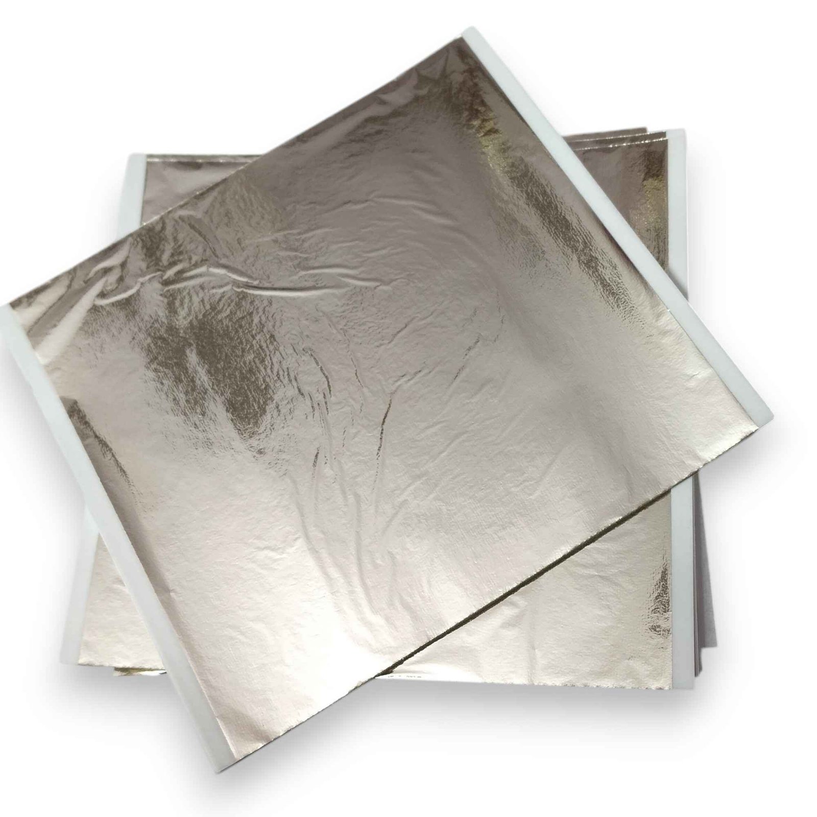 Light champagne silver foil sheet lifted from tissue-interleaved booklet
