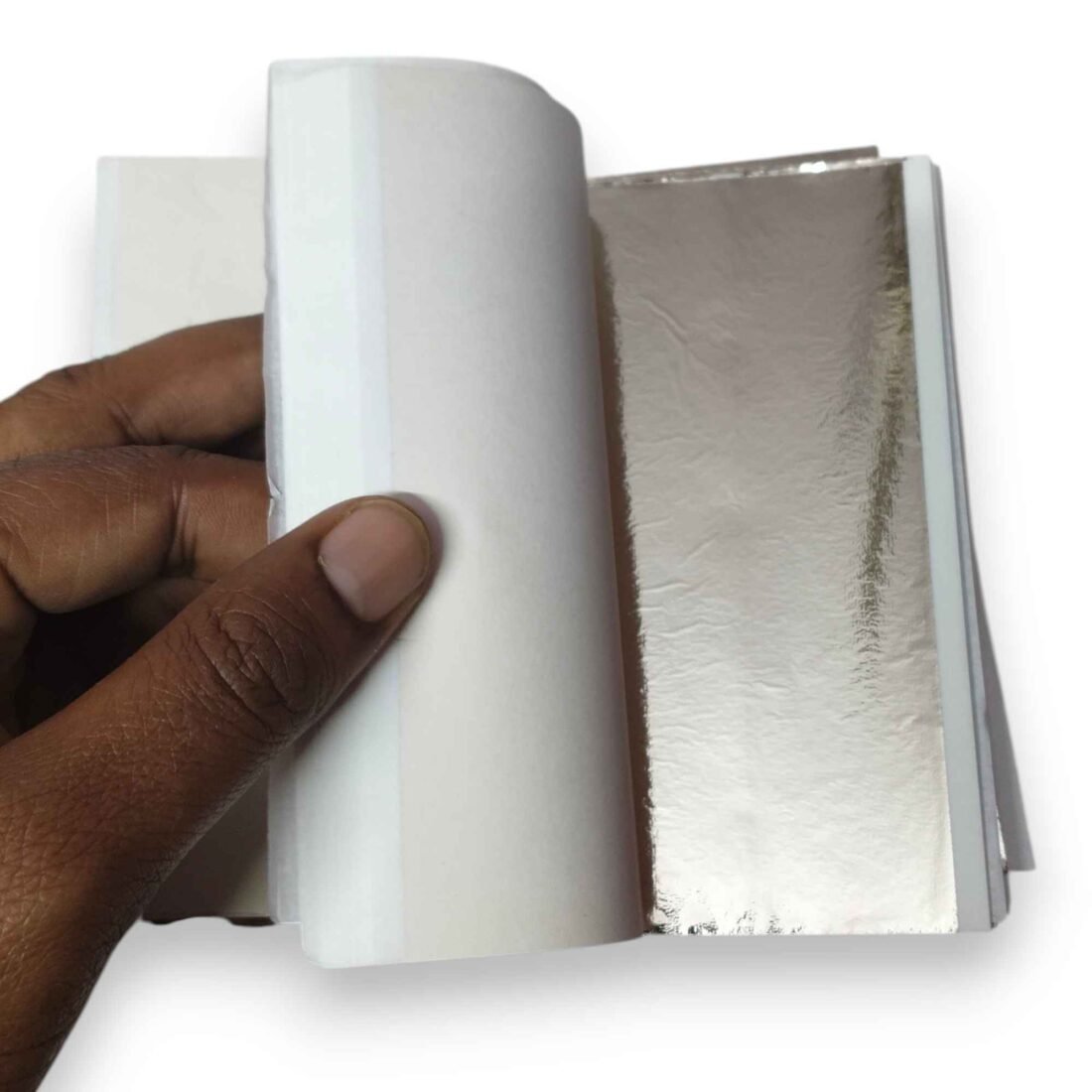 Single light champagne silver foil sheet 14x14 cm close up