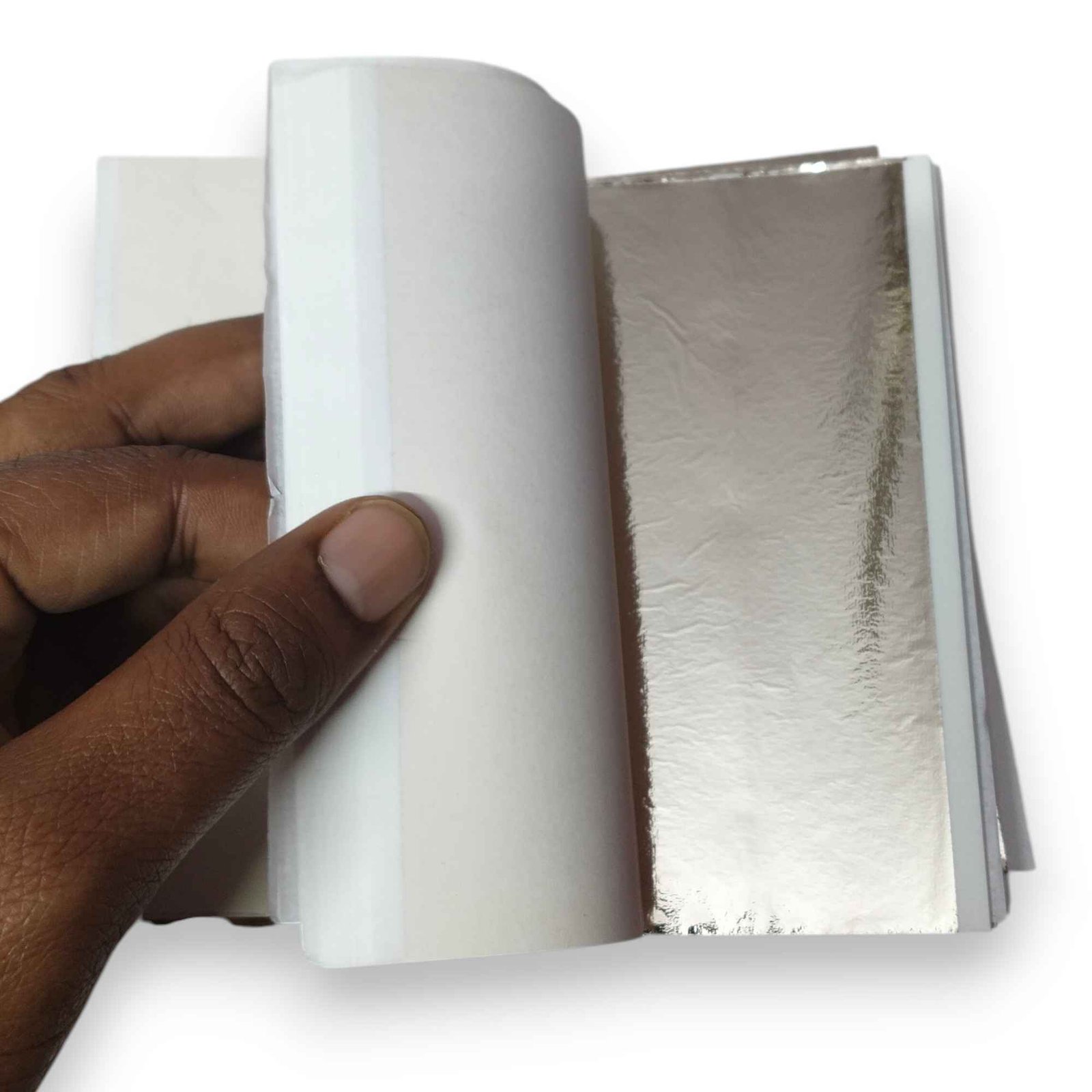 Single light champagne silver foil sheet 14x14 cm close up
