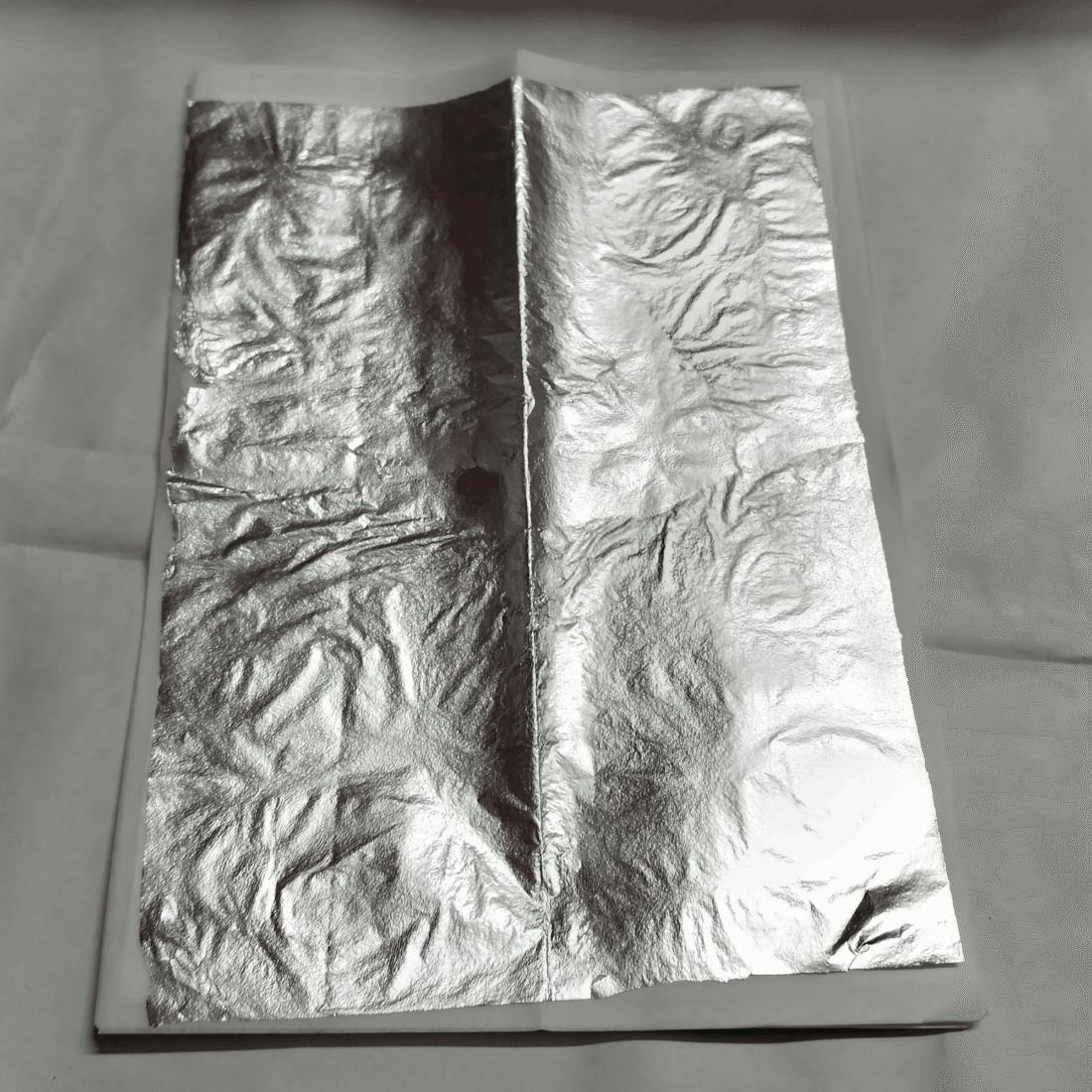 Open silver leaf sheet 6x8 inch on tissue paper