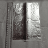 Silver leaf sheet 6x8 inch placed next to a measuring scale
