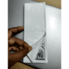 Silver leaf booklet being opened by hand