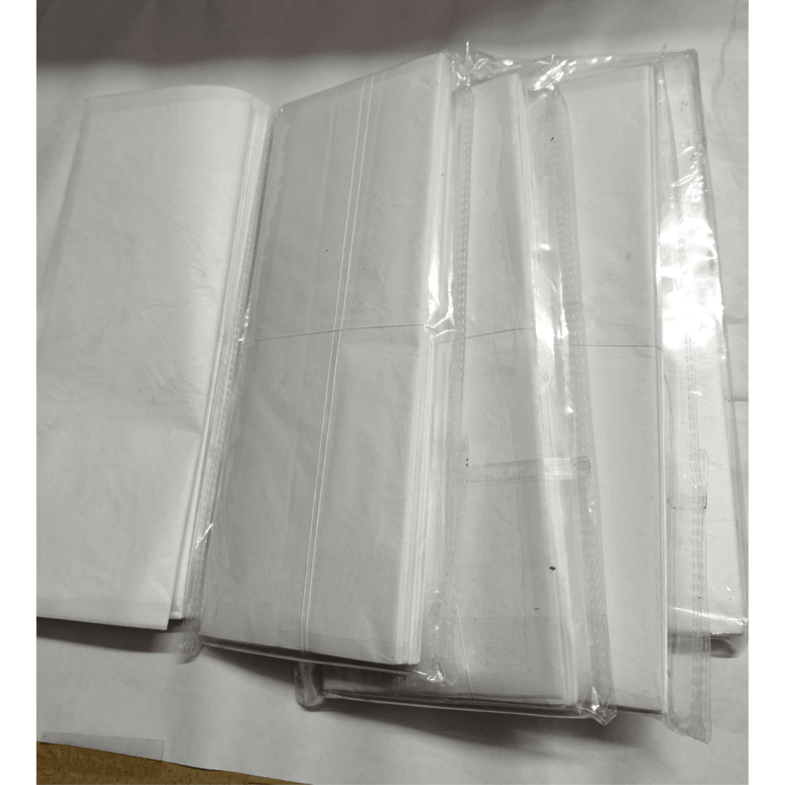 Packed silver leaf booklets in protective wrapping