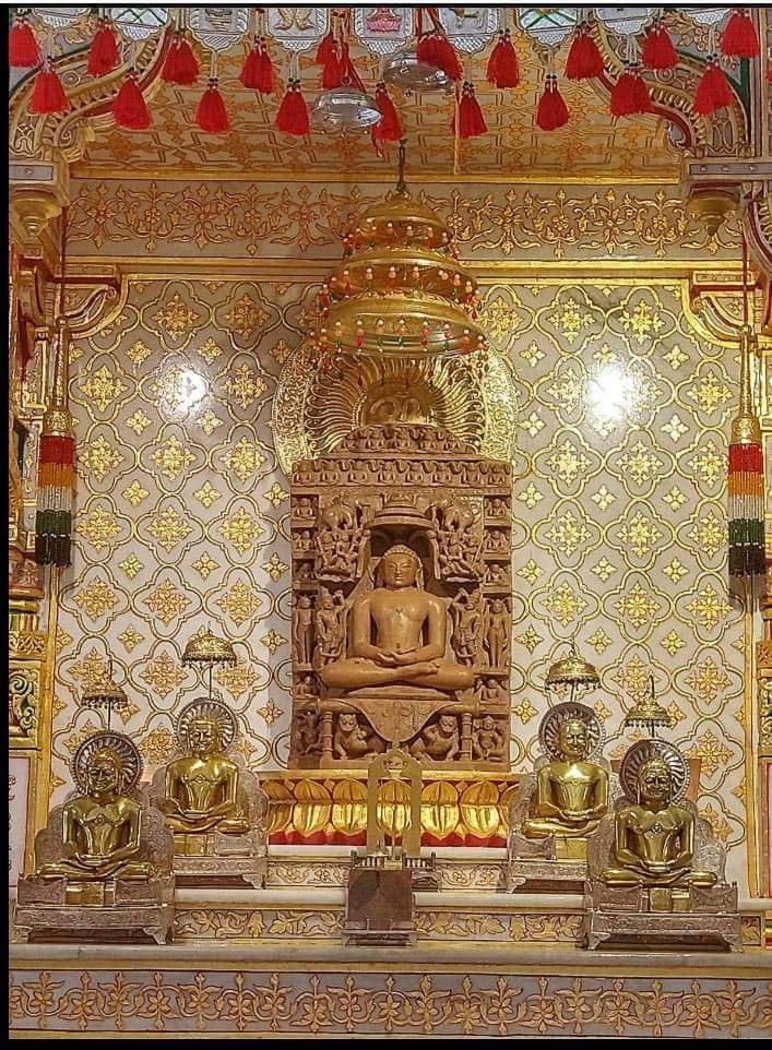 Gold leaf work on Jain mandir wall panels and murti by Sumera Warq