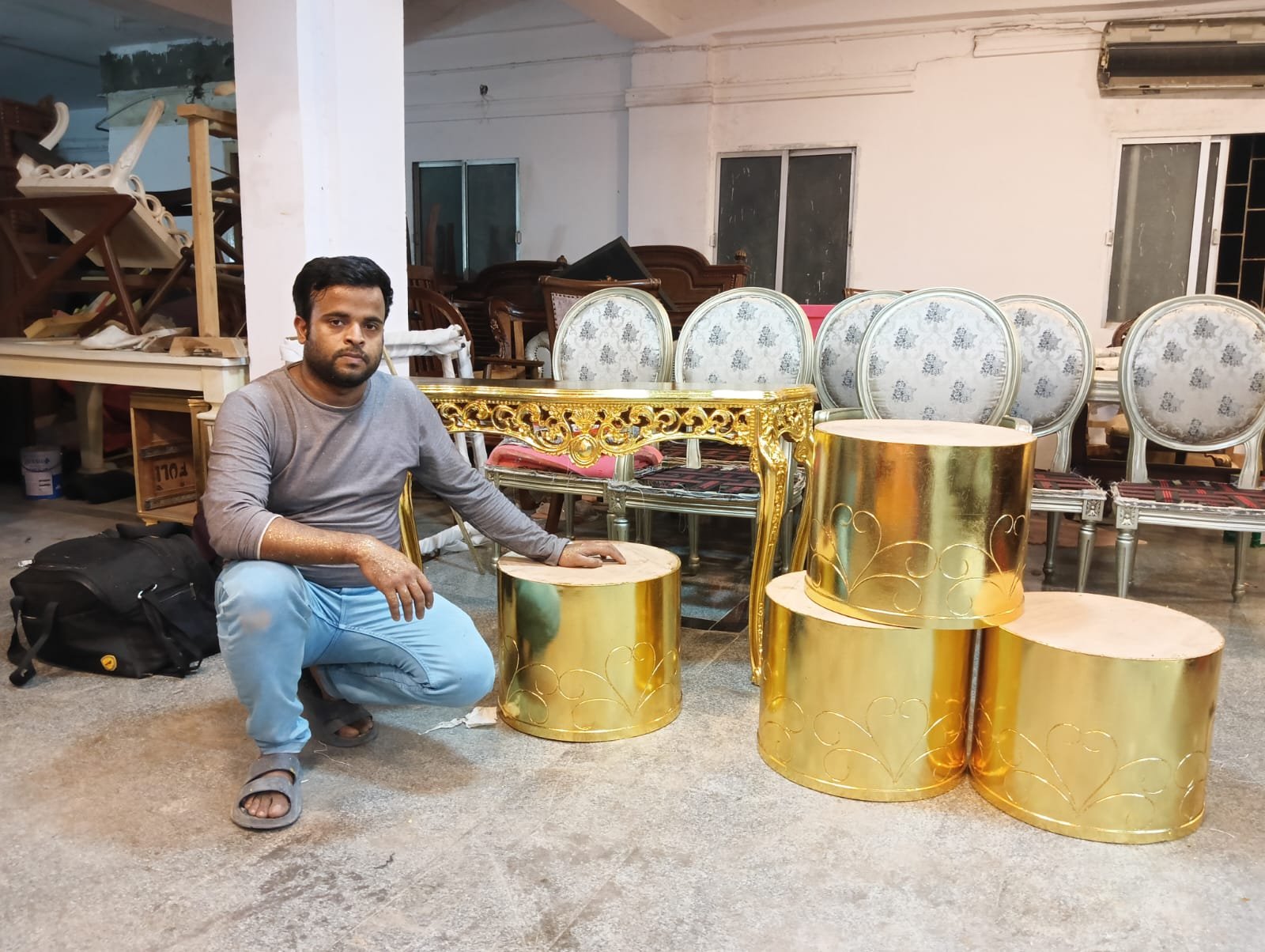 Gold leafed furniture pieces at Sumera Warq workshop