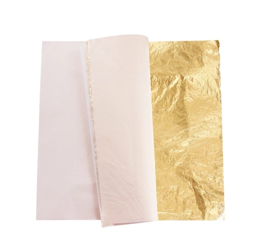 Gold leaf foil sheet 16x16 cm shown with tissue paper backing