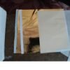 Gold leaf foil sheets 14x14 cm separated by tissue paper