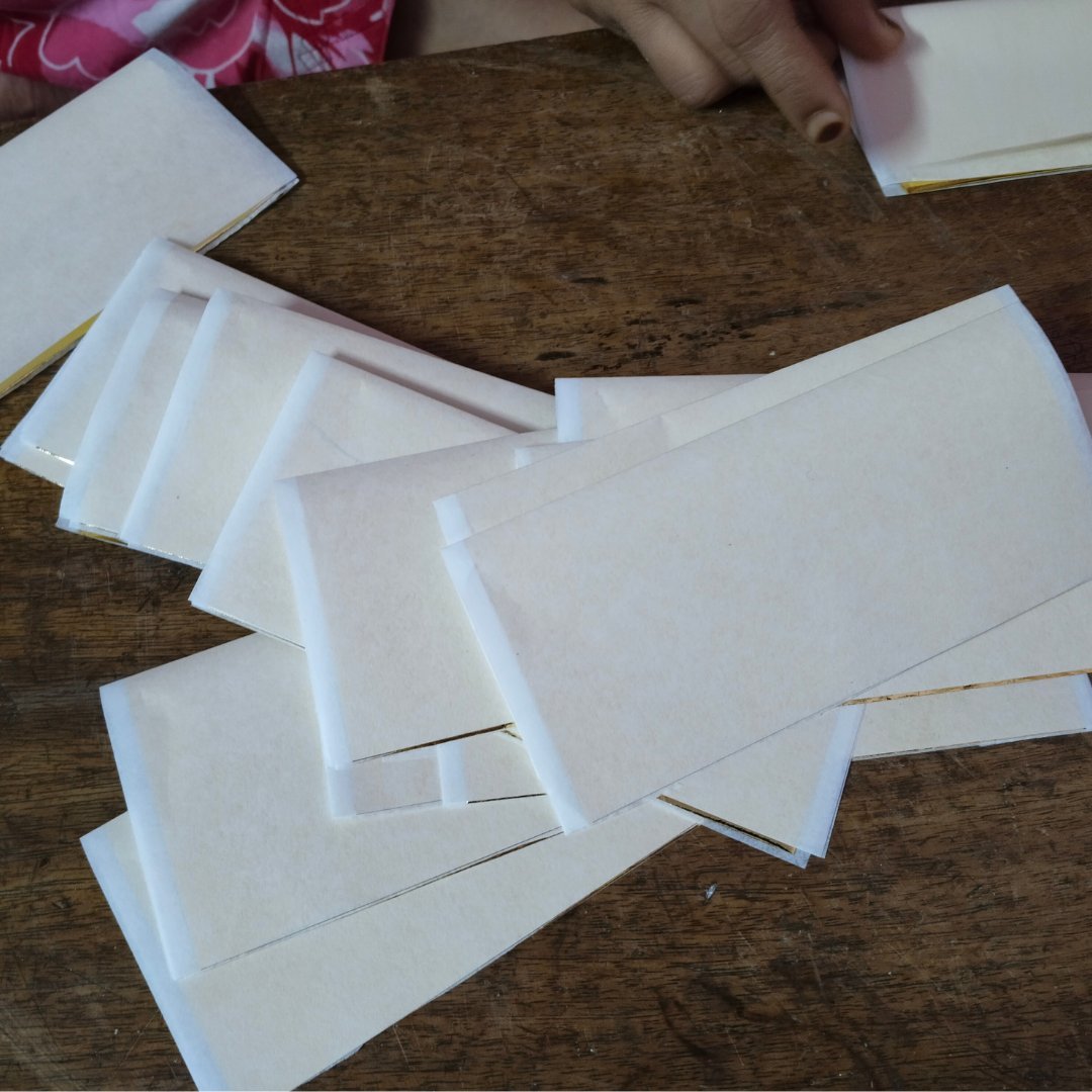 Folded packs of gold leaf foil sheets 14x14 cm