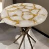 Gold leaf foil sheets used in a resin art side table top