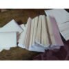 Stacked gaddis of gold leaf foil sheets 14x14 cm