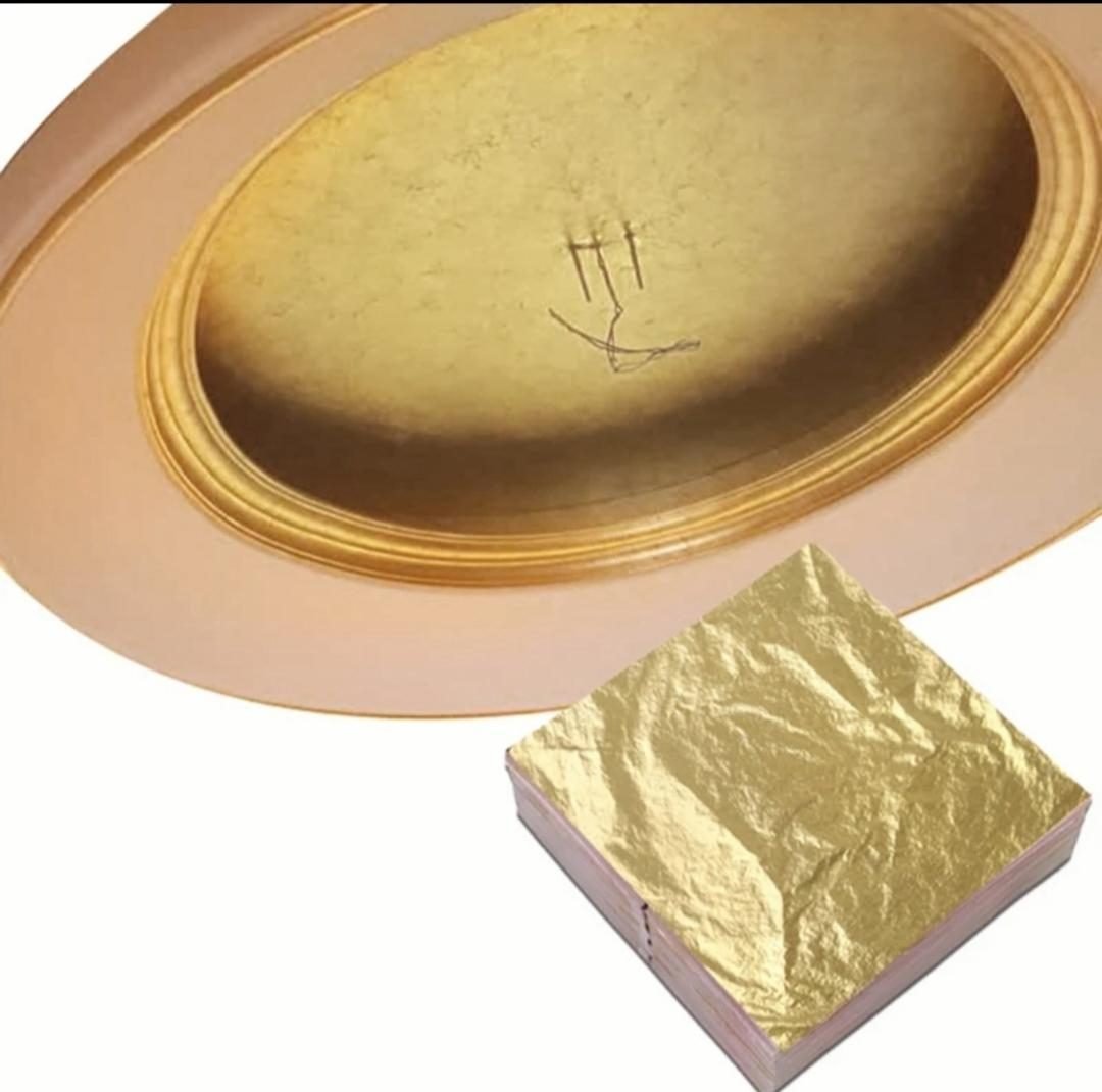 Gold leaf foil sheets applied on an oval wooden frame