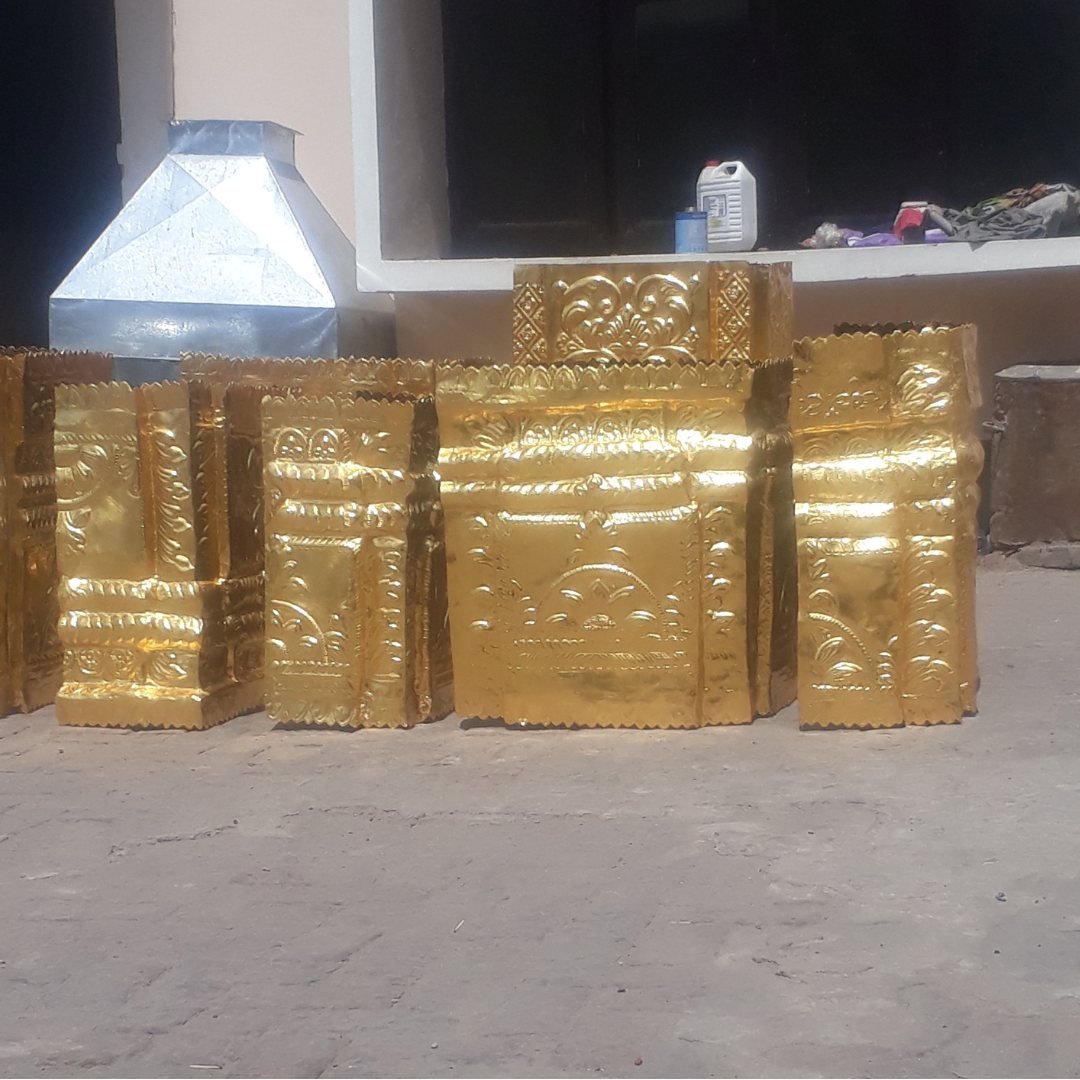 Gold plated mandir panels outdoor