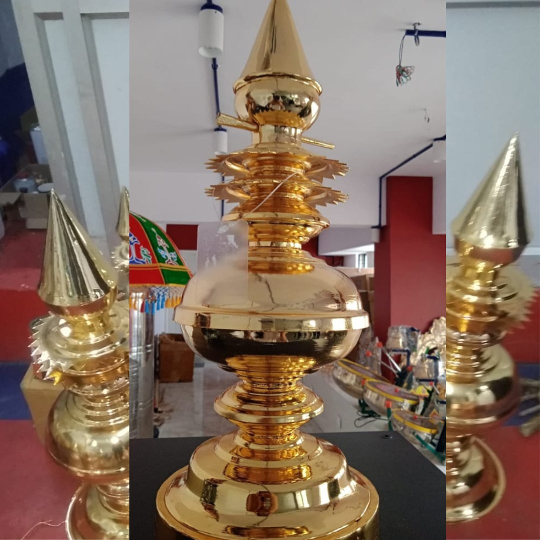 Gold plated mandir shikhar kalash in showroom