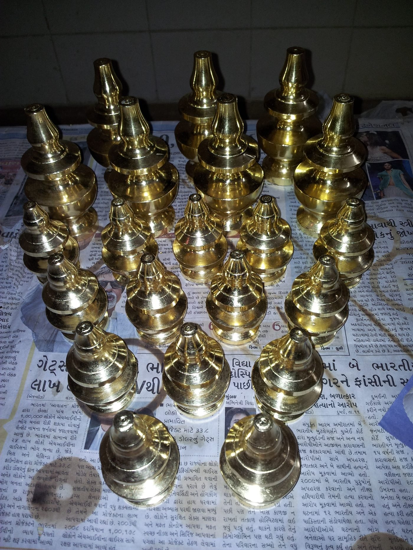 Mandir kalash after gold leafing in Sumera Warq workshop